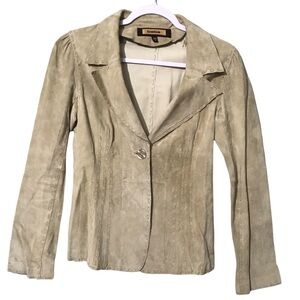 Bebe Genuine leather tan color with stitching size Medium
